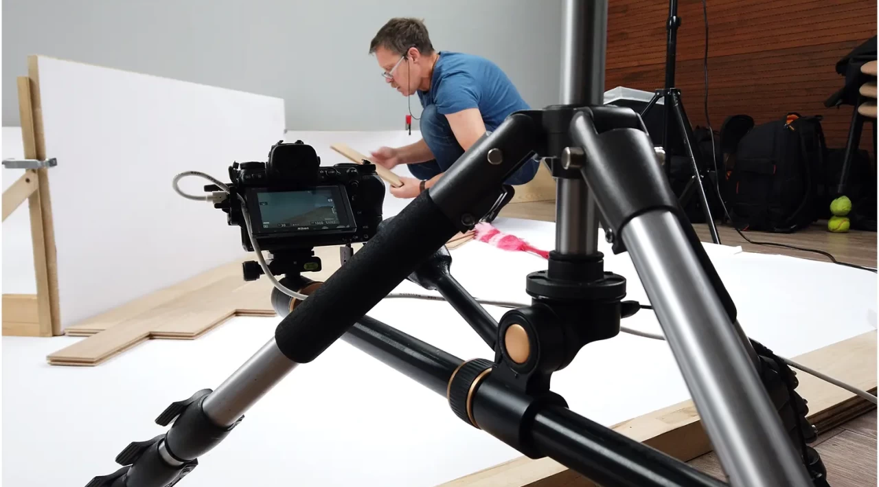 Stop-motion frame setup — preparing COSWICK parquet planks for animation