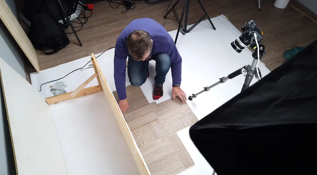 Laying parquet for the final stop-motion frame of the COSWICK video